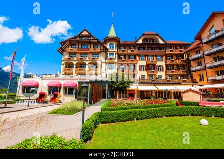 Traditional local houses in Wengen village in the Interlaken district in the Bern canton of Switzerland Stock Photo