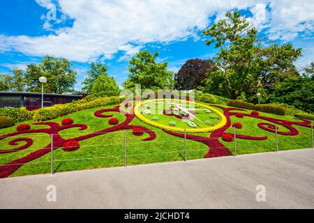 Flower clock or L'horloge fleurie is a symbol of the city watchmakers, located in Jardin Anglais park in Geneva city in Switzerland Stock Photo