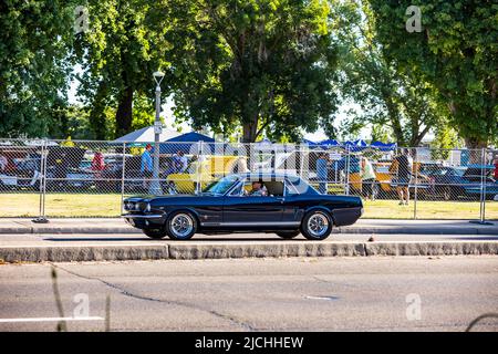 A 1966 Ford Mustang GT Arrives at the American Graffiti charity Car Show at the Modesto Junior College campus June 11-12 2022 Stock Photo