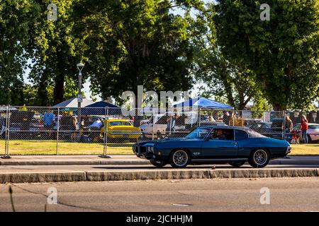 A 1970 Pontiac GTO arrives at the American Graffiti charity Car Show at the Modesto Junior College campus June 11-12 2022 Stock Photo