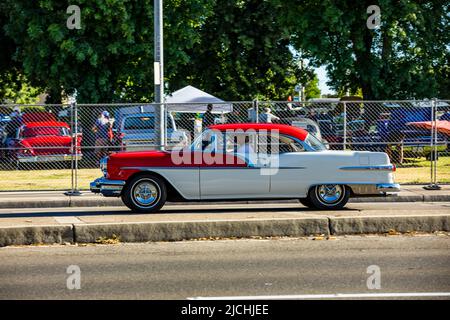 A 1956 Oldsmobile 88 coupe arrive at the American Graffiti charity Car Show at the Modesto Junior College campus June 11-12 2022 Stock Photo