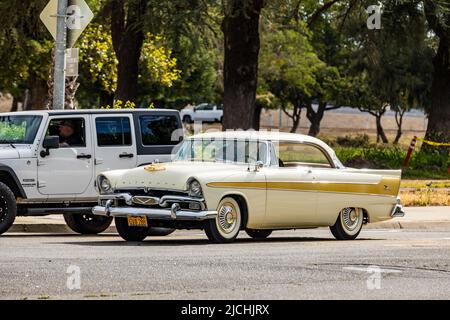 A 1956 Pymouth Belvedere arrives at the American Graffiti charity Car Show at the Modesto Junior College campus June 11-12 2022 Stock Photo