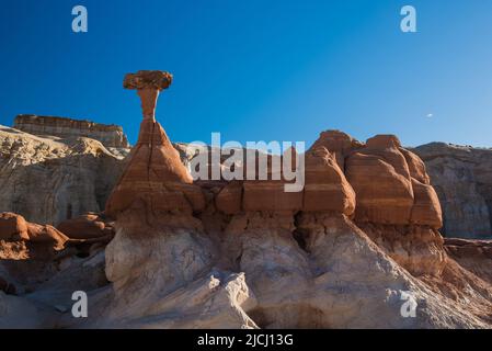 Toadstool rock formations near Kanab, UT. USA.  These formations are caused by erosion of soft sandstone underneath the harder rock on top. Stock Photo