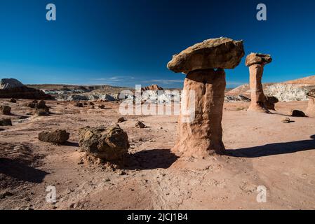 Toadstool rock formations near Kanab, Ut. USA. These unique formations are caused by erosion of soft stone underneath harder rock. Stock Photo