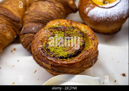 Austrian desserts, different types of chocolate and fruit cakes on display in cafe in Vienna. Stock Photo