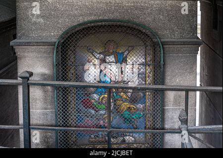 Exterior detail of a tomb stained glass window in Montmartre Cemetery. Paris, France. 05/2009 Stock Photo