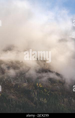 Clouds in mountain - Norway Stock Photo