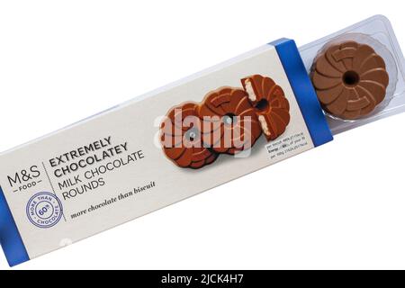 packet of Extremely Chocolatey Milk Chocolate Rounds biscuits from M&S opened to show contents set on white background Stock Photo