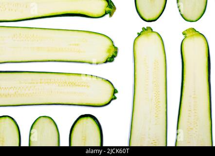 Fresh slices of zucchini isolated on white background Stock Photo