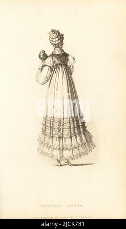 Regency lady in morning dress with pet parrot. Round dress in cambric trimmed with four rows of embroidery and two flounces, chemisette body, morning cornette hat of fine muslin, silk handkerchief over the shoulder. Vol. 2, Plate 28, November 1, 1816. Handcoloured copperplate engraving by Thomas Uwins from Rudolph Ackermann's Repository of Arts, Strand, London. Stock Photo