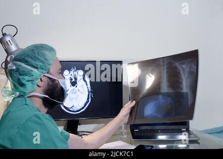 Young male doctor radiologist working in the clinic. Stock Photo