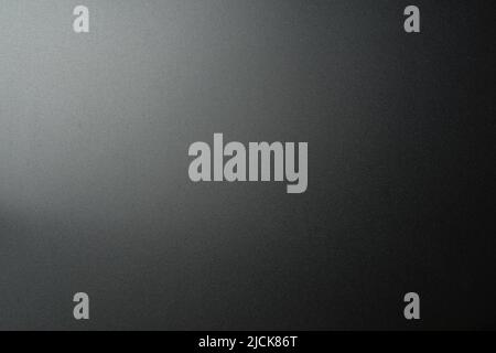 Black matte plastic background with texture and lighting. High quality photo Stock Photo