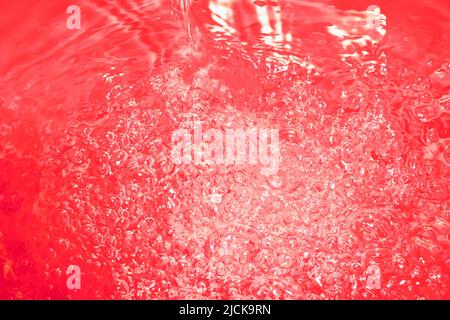 Red abstract chaotic backgroud with seamless pattern. Red liquid surface texture. Stock Photo