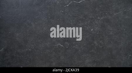 Black stone background. Top view. Free copy space. Stock Photo
