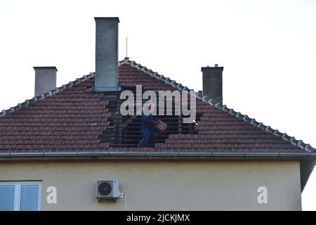 Lanzhot, Czech Republic. 13th June, 2022. Damage after a tornado in Lanzhot, Czech Republic, pictured on June 13, 2022. The tornado reaching probably 150 km/hour hit the Breclav locality, south Moravia. The disaster damaged some 30 houses in Lanzhot. Credit: Vaclav Salek/CTK Photo/Alamy Live News Stock Photo