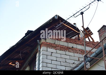 Lanzhot, Czech Republic. 13th June, 2022. Damage after a tornado in Lanzhot, Czech Republic, pictured on June 13, 2022. The tornado reaching probably 150 km/hour hit the Breclav locality, south Moravia. The disaster damaged some 30 houses in Lanzhot. Credit: Vaclav Salek/CTK Photo/Alamy Live News Stock Photo