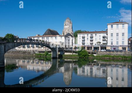 View of Saintes and the Charente river, dominated by the spire of the church église Saint-Pierre, France Stock Photo