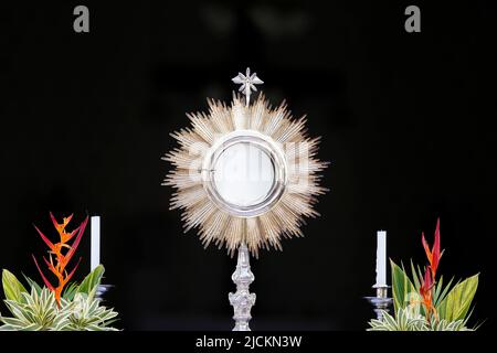 ostensory - rear view of a Blessed Sacrament exposed in a Catholic church - Corpus Christi Stock Photo