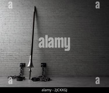 A play on words concept showing an upstanding medieval wooden lance released from iron shackles connected to an isolated brick wall  - 3D render Stock Photo