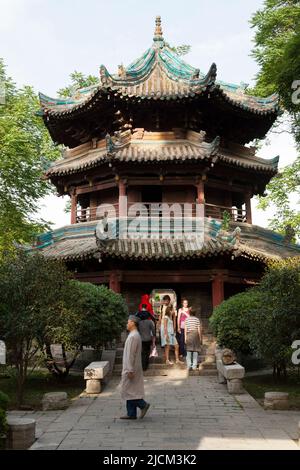 Minaret in the style of a Chinese pagoda building with three tiers & sweeping roof in the grounds of The Great Mosque of Xi'an is one of the largest premodern mosques in China. PRC. (125) Stock Photo