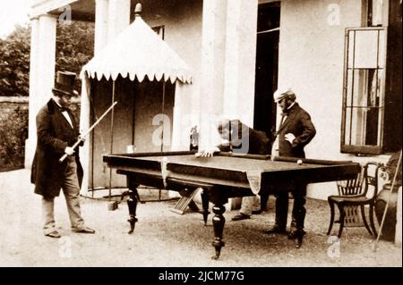 Gentlemen playing billiards, probably 1860/70s Stock Photo