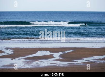 Surfing on Zarautz beach, in the city of San Sebastian Stock Photo