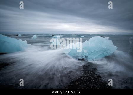 Icebergs and black sand on Jokulsarson Diamond beach, Iceland Stock Photo