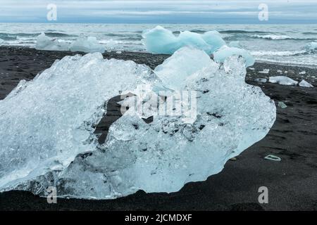 Icebergs and black sand on Jokulsarson Diamond beach, Iceland Stock Photo