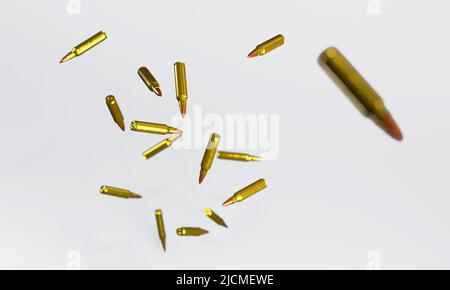 3d render of flying or dropping rifle bullets for gun violence or control concepts. Stock Photo