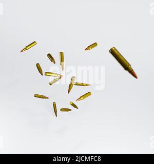 3d render of flying or dropping rifle bullets for gun violence or control concepts. Stock Photo