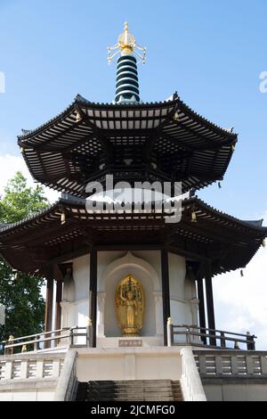 The Battersea Park Peace Pagoda is a Buddhist stupa located in Battersea Park, next to the River Thames. Stock Photo