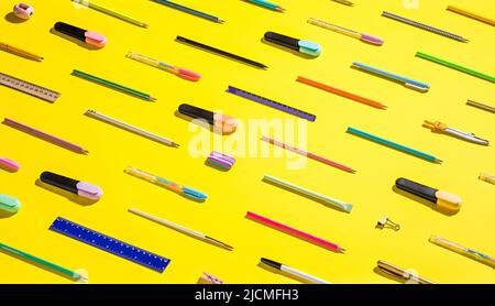 School stationery on a yellow background. Back to school creative photo Stock Photo