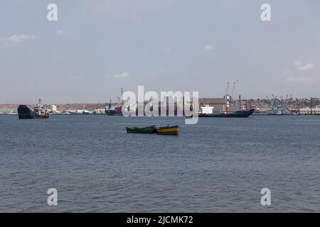 Luanda Angola - 10 13 2021: View of a fishing boats, oil tanker and