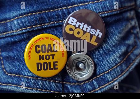 Coal Not Dole & British Coal badge on a miners supporters denim jacket, 1984 British dispute, NUM vs Margaret Thatcher, The miners Stock Photo