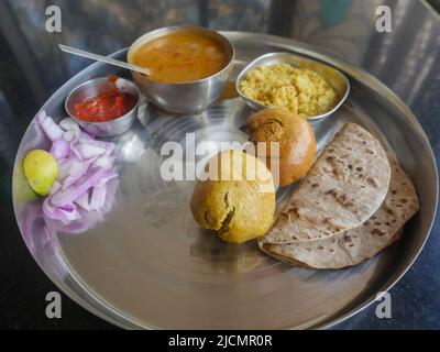 Dal bati rajasthani traditional vegetarian food plat in rural india Stock Photo