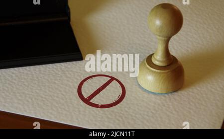 Banned stamp and stamping hand. Ban, restricted and prohibited symbol concept. Stock Photo