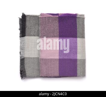Folded soft plaid woolen scarf isolated on white Stock Photo