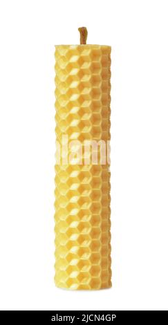 Front view of yellow beeswax honeycomb candle isolated on white Stock Photo