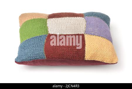 Colorful handmade knitted pillow isolated on white Stock Photo