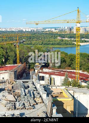 Construction site in Peremga park, left riverbank view, Kiyv summertime cityscape, Ukraine Stock Photo
