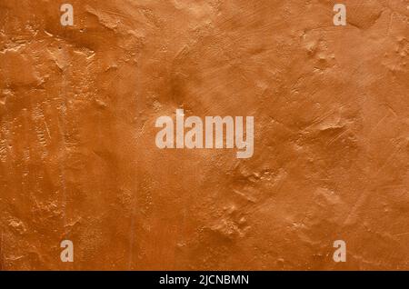 Copper textured background, reddish-orange metallic surface, painted. Stock Photo