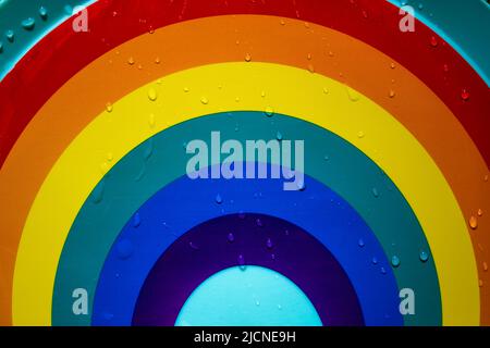 Multicolored rainbow with rain drops background. LGBT, LGBTQ symbol. Pride Month Stock Photo