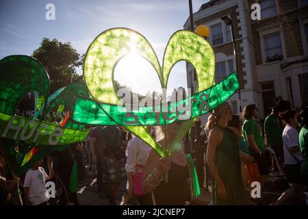 London, UK. 14th June 2022. Survivers and supporters have  gathered to mark the 5th anniversary of the Grenfell disaster and to remember the 72 people who lost their lives when a fire broke out at the block of flats in West London in 2017. Credit: Kiki Streitberger/Alamy Live News Stock Photo