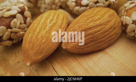 Nuts close up. Organic mixed nuts as background. Natural background made from different kinds of nuts. Stock Photo