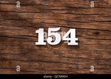 Number 154 in wood, isolated on white background Stock Photo - Alamy