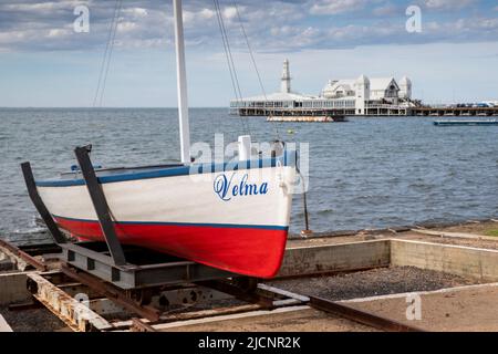 Double ended fishing boat Velma and The Pier Geelong, Victoria, Australia on Sunday, April 17, 2022.Photo: David Rowland / One-Image.com Stock Photo