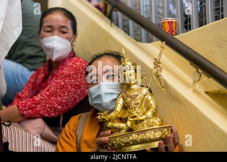 Dharmashala, Himachal Pradesh, India. 14th June, 2022. Tibetan women in exile with offering for Tibetan Spiritual Leader the Dalai Lama during the last day of two-day teaching on Tsongkhapa's Concise Stages for the Path to Enlightenment (lamrim dudon) and confer the Avalokiteshvara Jinasagara Initiation (chenrezig gyalwa gyatso wang) on the occasion of Buddha Shakyamuni's Birth, Enlightenment and Parinirvana Day (sa-dhe duechen), at Tsugla Khang Temple, Mcleodganj, Dharamshala on Tuesday. (Credit Image: © Shailesh Bhatnagar/Pacific Press via ZUMA Press Wire) Stock Photo