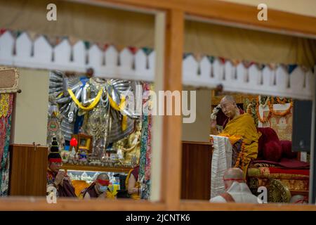 Dharmashala, Himachal Pradesh, India. 14th June, 2022. Tibetan Spiritual Leader the Dalai Lama during the last day of two-day teaching on Tsongkhapa's Concise Stages for the Path to Enlightenment (lamrim dudon) and confer the Avalokiteshvara Jinasagara Initiation (chenrezig gyalwa gyatso wang) on the occasion of Buddha Shakyamuni's Birth, Enlightenment and Parinirvana Day (sa-dhe duechen), at Tsugla Khang Temple, Mcleodganj, Dharamshala on Tuesday. (Credit Image: © Shailesh Bhatnagar/Pacific Press via ZUMA Press Wire) Stock Photo