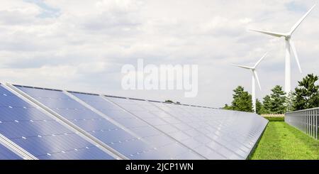 Solar panels and wind turbine on the sky background.3D rendering Stock Photo