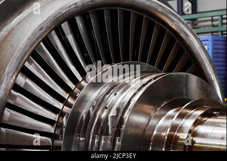 A powerful steam turbine rotor is installed in the lodgment of the steam turbine base. Stock Photo